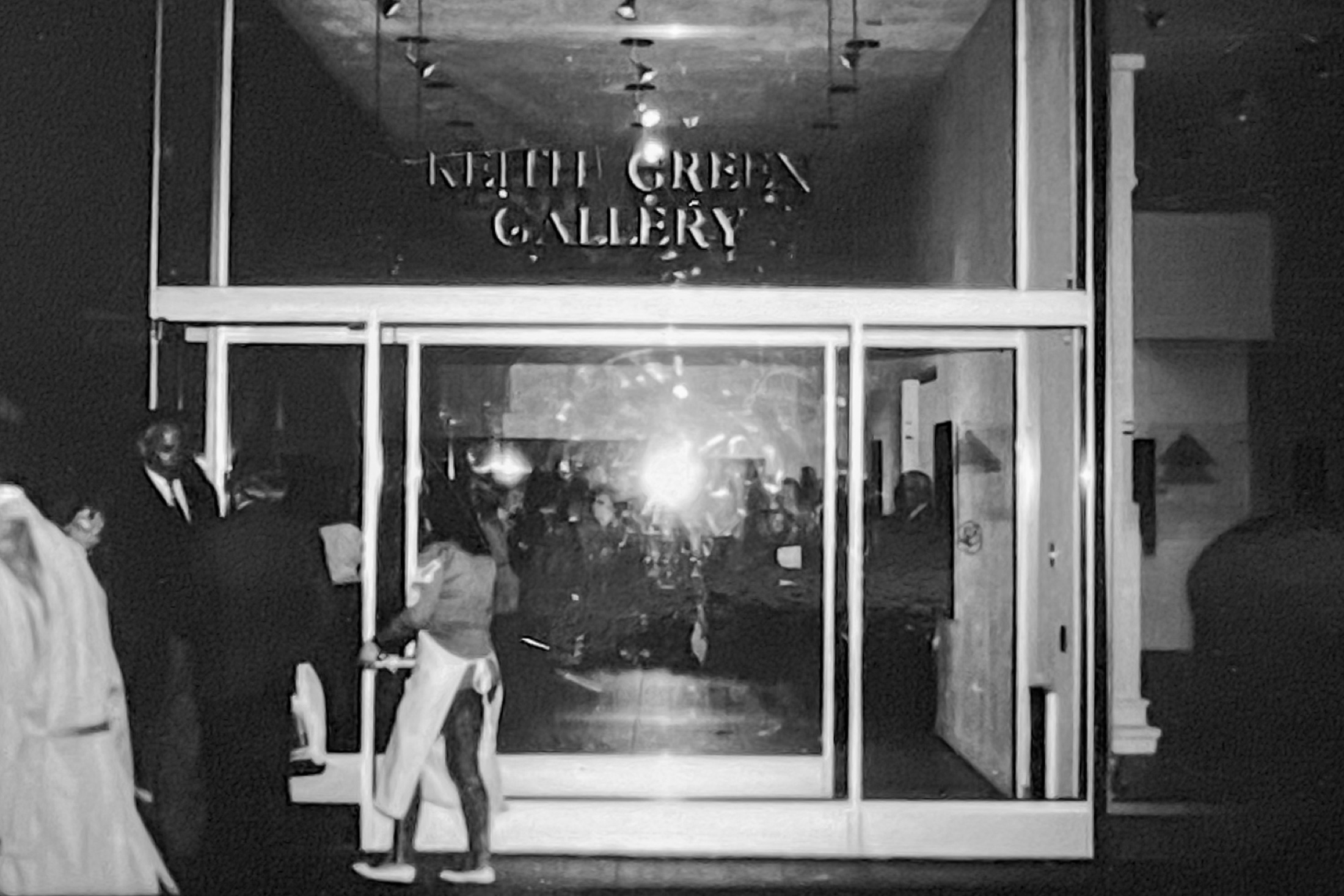 The Keith Green Gallery on Park Avenue, New York, lit at night with guests inside on the evening of the opening, 1988
